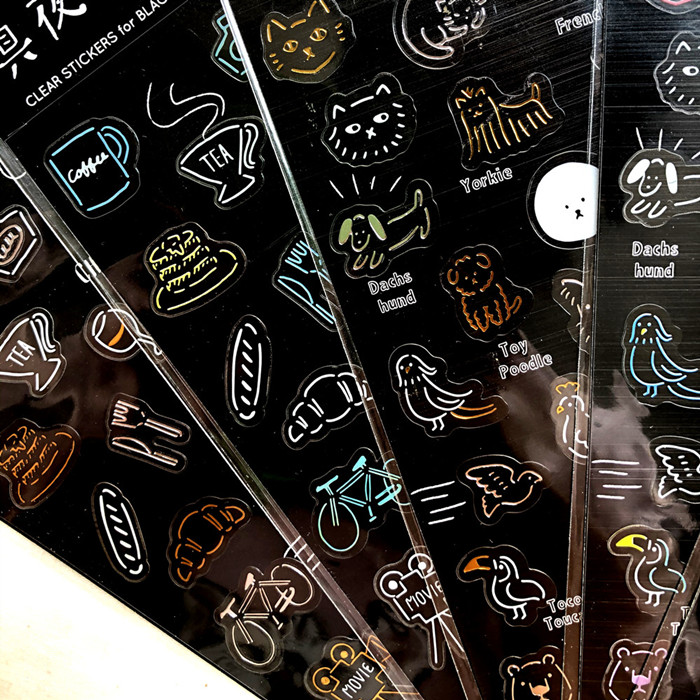 transparent PVC stickers in black backpaper