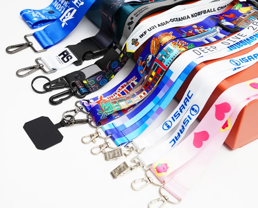 Assorted custom sublimation printed lanyards with colorful designs and different attachments